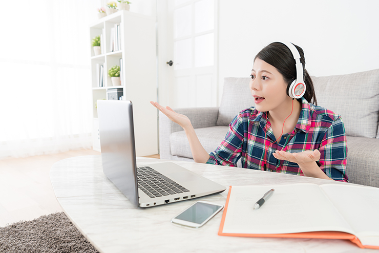 young college girl student using e-learning system